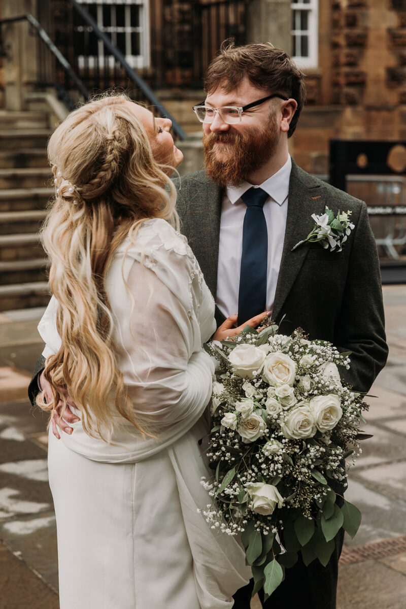 close up of bride and groom.